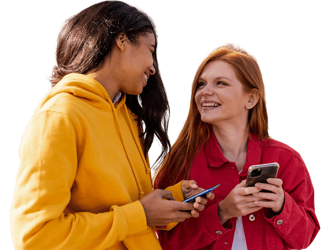 Two women using mobile phones